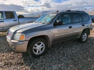 2007 GMC Envoy SLT with VIN 1GKDT13S672228454, listed as a Copart auction lot 84955184 with 207,510 mi miles and Salvage Title. Bid and sale history available at carsss.com. Image 1.