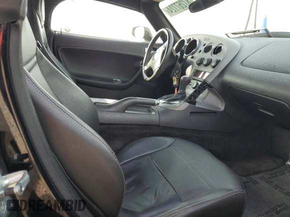 2007 Pontiac Solstice z VIN 1G2MB35B97Y117728, wystawiony jako Copart lot #87267724 z przebiegiem Nie podano mil oraz Szkoda całkowita • Salvage title. Historia ofert i sprzedaży dostępna na DreamBid. Obrazek 10.