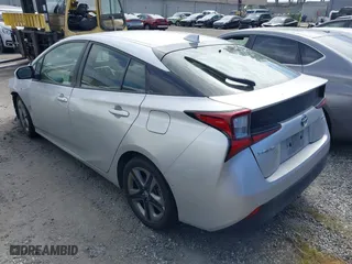 2022 Toyota Prius L Eco with VIN JTDKAMFU0N3181467, listed as a IAAI auction lot 41802679 with 121,749 mi miles. Bid and sale history available at carsss.com. Image 3.