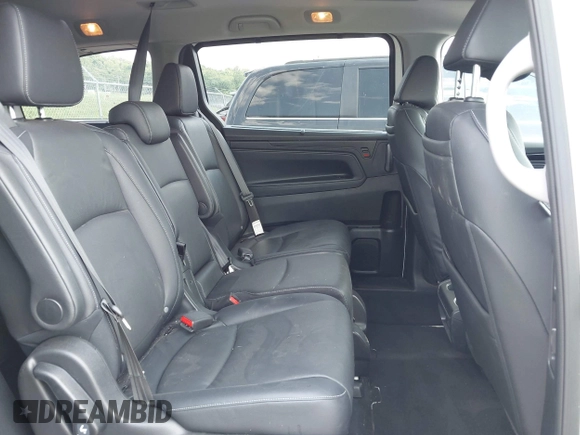 2023 Honda Odyssey Touring with VIN 5FNRL6H8XPB038875, listed as a IAAI auction lot 42441076 with 13,947 mi miles and . Bid and sale history available at DreamBid. Image 8.