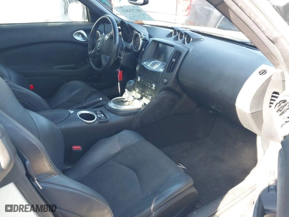 2010 Nissan 370Z Touring with VIN JN1AZ4FH5AM301858, listed as a IAAI auction lot 40716825 with 79,234 mi miles. Bid and sale history available at carsss.com. Image 5.