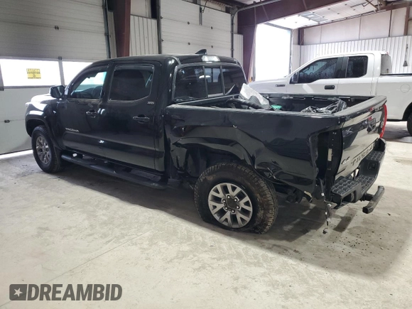 2017 Toyota Tacoma SR5 with VIN 5TFCZ5AN8HX067720, listed as a Copart auction lot 84801184 with 76,148 mi miles and Salvage title. Bid and sale history available at DreamBid. Image 2.