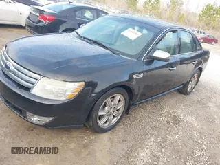 2009 Ford Taurus Limited with VIN 1FAHP25W09G121399, listed as a IAAI auction lot 41443202 with 195,187 mi miles. Bid and sale history available at carsss.com. Image 2.