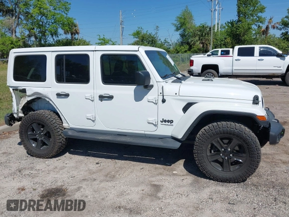 2020 Jeep Wrangler Unlimited Sahara with VIN 1C4HJXEN4LW330867, listed as a IAAI auction lot 41790709 with 63,151 mi miles. Bid and sale history available at carsss.com. Image 13.