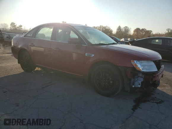 2009 Ford Taurus SEL with VIN 1FAHP24W09G110386, listed as a Copart auction lot 77953694 with 105,869 mi miles and Salvage Title. Bid and sale history available at carsss.com. Image 4.