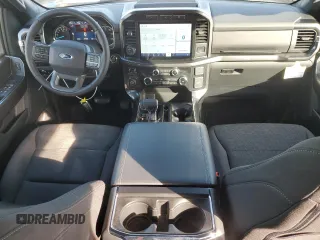 2023 Ford F-150 XL with VIN 1FTEW1EP4PFB38678, listed as a Copart auction lot 43024045 with 8,718 mi miles and Salvage title. Bid and sale history available at DreamBid. Image 8.