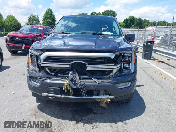2021 Ford F-150 XL z VIN 1FTFW1ED5MFA85060, wystawiony jako IAAI lot #42240727 z przebiegiem 150 378 mil mil oraz . Historia ofert i sprzedaży dostępna na DreamBid. Obrazek 12.
