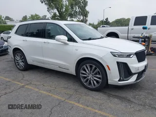 2020 Cadillac XT6 AWD Sport with VIN 1GYKPGRS3LZ109757, listed as a IAAI auction lot 42591551 with 147,241 mi miles and . Bid and sale history available at DreamBid. Image 1.