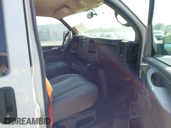 2014 Chevrolet Express Cargo with VIN 1GCSGAFX2E1156590, listed as a IAAI auction lot 42740427 with 351,114 mi miles and . Bid and sale history available at DreamBid. Image 5.