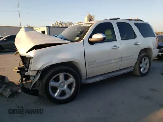 2012 Chevrolet Tahoe LTZ z VIN 1GNSCCE06CR326340, wystawiony jako Copart lot #85800344 z przebiegiem Nie podano mil oraz Szkoda całkowita • Salvage title. Historia ofert i sprzedaży dostępna na DreamBid. Obrazek 1.
