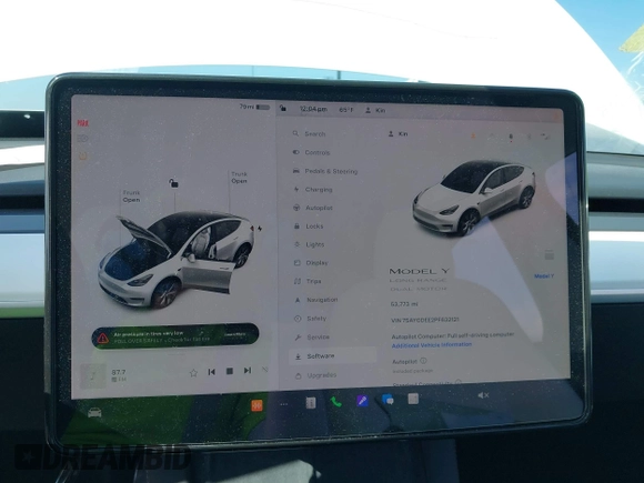 2023 Tesla Model Y Long Range with VIN 7SAYGDEE2PF632121, listed as a IAAI auction lot 41798780 with 53,773 mi miles. Bid and sale history available at carsss.com. Image 7.