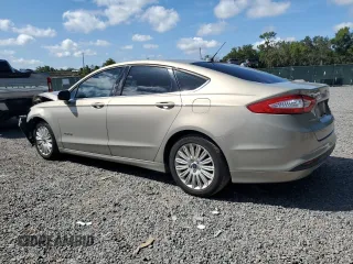 2015 Ford Fusion SE Hybrid z VIN 3FA6P0LU7FR102723, wystawiony jako Copart lot #62334345 z przebiegiem 136 341 mil mil oraz Nie do naprawy • Non repairable. Historia ofert i sprzedaży dostępna na DreamBid. Obrazek 2.