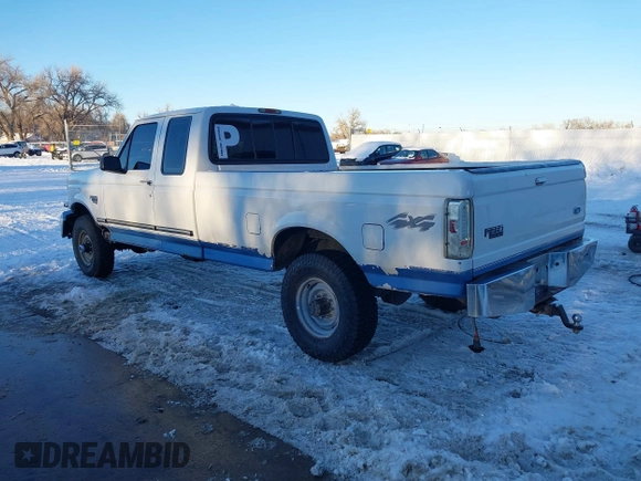 1997 Ford F-250 HD with VIN 1FTHX26F1VEA49739, listed as a IAAI auction lot 41238799 with 337,959 mi miles. Bid and sale history available at carsss.com. Image 3.