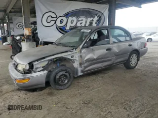 1995 Toyota Corolla with VIN 1NXAE04B9SZ320278, listed as a Copart auction lot 64883045 with 189,694 mi miles and Clean title. Bid and sale history available at DreamBid. Image 1.