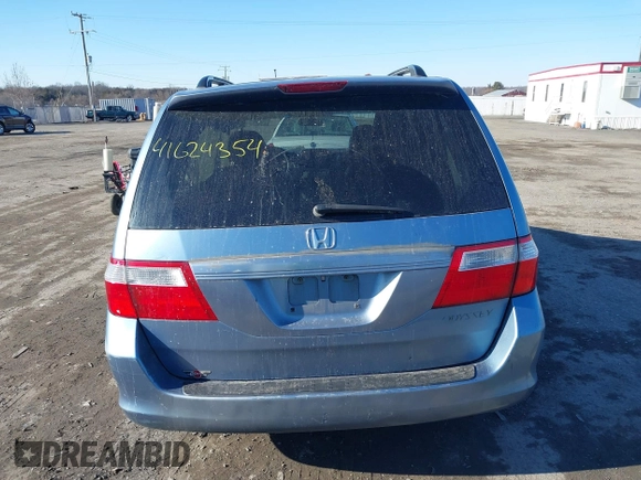 2005 Honda Odyssey EX-L with VIN 5FNRL38765B076591, listed as a IAAI auction lot 41624354 with 172,698 mi miles and . Bid and sale history available at DreamBid. Image 15.
