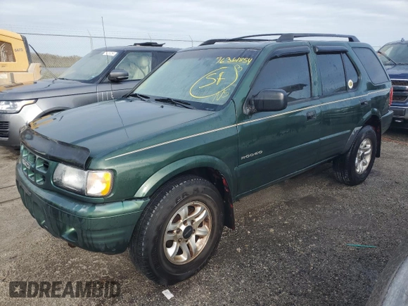 2002 Isuzu Rodeo S z VIN 4S2CK58W024333487, wystawiony jako Copart lot #76361854 z przebiegiem Nie podano mil oraz Nie do naprawy • Non repairable. Historia ofert i sprzedaży dostępna na DreamBid. Obrazek 1.