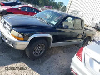 2003 Dodge Dakota SLT with VIN 1D7HL48X93S151422, listed as a IAAI auction lot 40661577 with 238,586 mi miles. Bid and sale history available at carsss.com. Image 2.