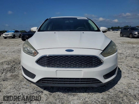 2015 Ford Focus SE with VIN 1FADP3F22FL218056, listed as a Copart auction lot 63093805 with 145,824 mi miles and Clean title. Bid and sale history available at DreamBid. Image 5.