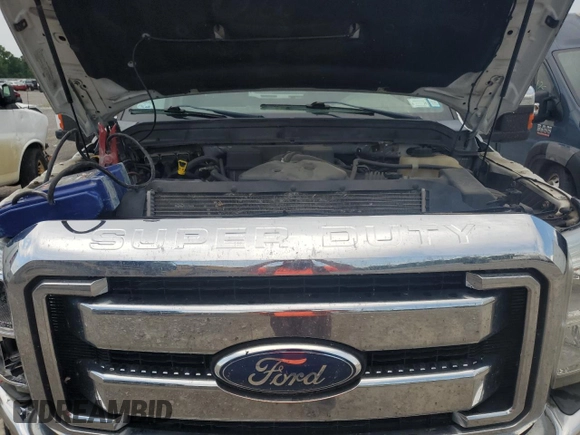 2011 Ford F-250 XL with VIN 1FT7X2B66BEC41526, listed as a Copart auction lot 63617455 with 197,068 mi miles and Salvage title. Bid and sale history available at DreamBid. Image 11.