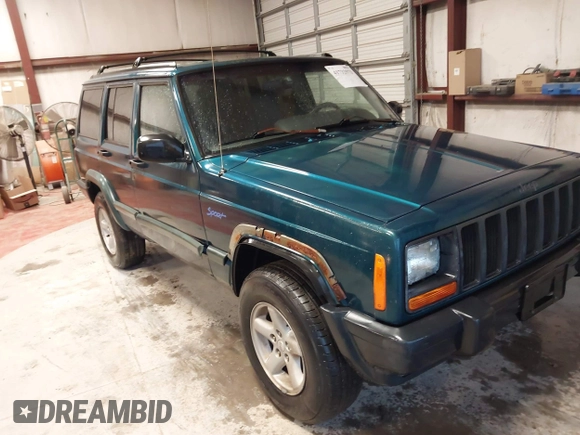 1997 Jeep Cherokee Sport with VIN 1J4FJ68S9VL594152, listed as a IAAI auction lot 41732573 with 65,316 mi miles. Bid and sale history available at carsss.com. Image 1.