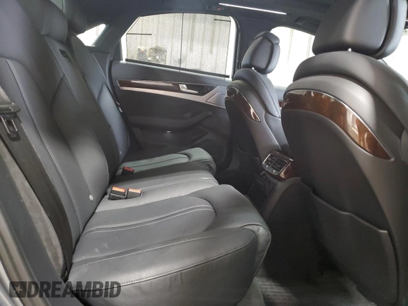 2015 Audi A8 z VIN WAUJGAFDXFN008499, wystawiony jako Copart lot #87658385 z przebiegiem 103 175 mil mil oraz Szkoda całkowita • Salvage title. Historia ofert i sprzedaży dostępna na DreamBid. Obrazek 10.