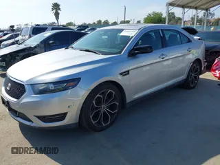2014 Ford Taurus SHO with VIN 1FAHP2KT8EG123342, listed as a IAAI auction lot 42095390 with 142,957 mi miles. Bid and sale history available at carsss.com. Image 17.
