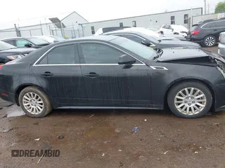 2013 Cadillac CTS Luxury z VIN 1G6DG5E52D0111849, wystawiony jako IAAI lot #42130235 z przebiegiem 129 993 mil mil oraz . Historia ofert i sprzedaży dostępna na DreamBid. Obrazek 13.