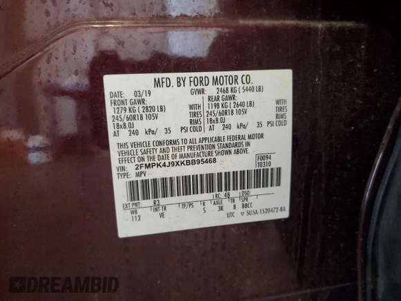 2019 Ford Edge SEL with VIN 2FMPK4J9XKBB95468, listed as a Copart auction lot 62080795 with 79,072 mi miles and Salvage title. Bid and sale history available at DreamBid. Image 13.