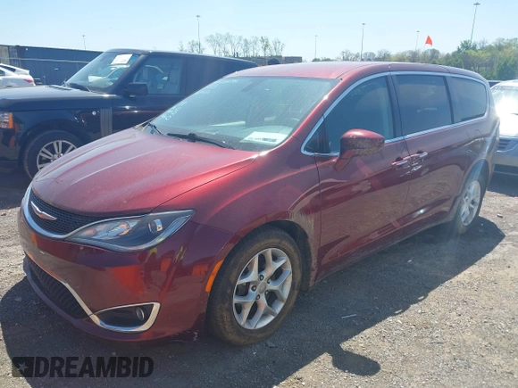 2020 Chrysler Pacifica Touring with VIN 2C4RC1FG5LR104163, listed as a IAAI auction lot 42018070 with 188,386 mi miles and . Bid and sale history available at DreamBid. Image 17.