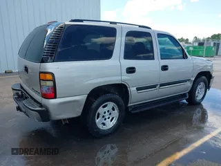 2004 Chevrolet Tahoe LS with VIN 1GNEC13V04R216255, listed as a IAAI auction lot 42531035 with 309,058 mi miles and . Bid and sale history available at DreamBid. Image 4.
