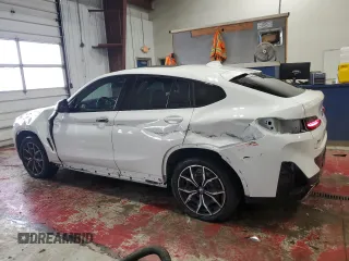 2023 BMW X4 xDrive30i with VIN 5UX33DT07P9P12954, listed as a Copart auction lot 42596275 with 27,590 mi miles and Salvage Title. Bid and sale history available at carsss.com. Image 2.