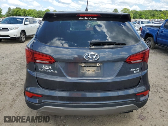 2018 Hyundai Santa Fe 2.4L z VIN 5XYZTDLB4JG521026, wystawiony jako Copart lot #56563175 z przebiegiem 173 170 mil mil oraz Czysty tytuł • Clean title. Historia ofert i sprzedaży dostępna na DreamBid. Obrazek 6.