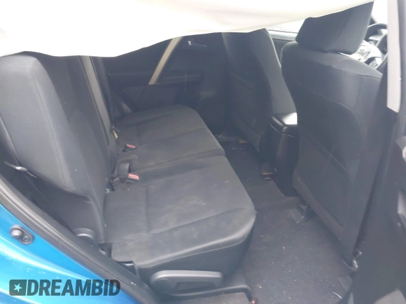 2016 Toyota RAV4 LE with VIN JTMBFREV9GJ100635, listed as a IAAI auction lot 41858669 with 171,644 mi miles. Bid and sale history available at carsss.com. Image 8.