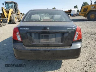 2008 Suzuki Forenza z VIN KL5JD56ZX8K974392, wystawiony jako Copart lot #64694854 z przebiegiem 145 180 mil mil oraz Szkoda całkowita • Salvage title. Historia ofert i sprzedaży dostępna na DreamBid. Obrazek 6.