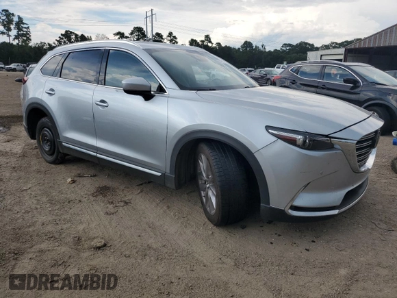2020 Mazda CX-9 Grand Touring with VIN JM3TCADY6L0405463, listed as a Copart auction lot 62715194 with 100,663 mi miles and Salvage title. Bid and sale history available at DreamBid. Image 4.