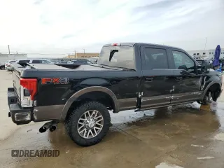 2017 Ford Super Duty F-250 SRW Lariat with VIN 1FT7W2BTXHEC19787, listed as a Copart auction lot 44925605 with 143,552 mi miles and Salvage Title. Bid and sale history available at carsss.com. Image 3.