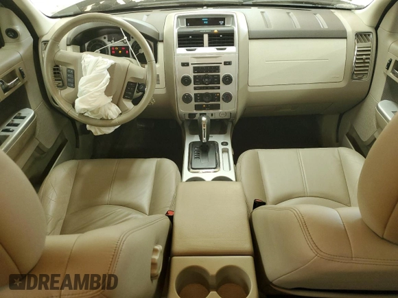 2009 Mercury Mariner Premier z VIN 4M2CU87GX9KJ17731, wystawiony jako Copart lot #54204855 z przebiegiem 54 521 mil mil oraz Szkody całkowita. Historia ofert i sprzedaży dostępna na DreamBid. Obrazek 8.