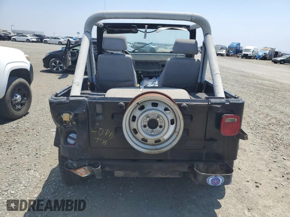 1990 Jeep Wrangler with VIN 2J4FY29T8LJ541585, listed as a Copart auction lot 54352634 with 138,022 mi miles and Salvage Title. Bid and sale history available at carsss.com. Image 6.
