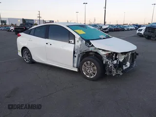 2020 Toyota Prius LE with VIN JTDKARFPXL3154734, listed as a IAAI auction lot 41798874 with 96,255 mi miles and . Bid and sale history available at DreamBid. Image 1.