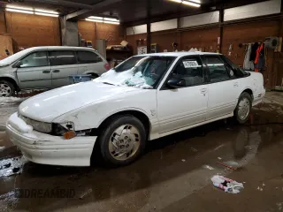 1997 Oldsmobile Cutlass Supreme S z VIN 1G3WH52M2VF354848, wystawiony jako Copart lot #41706835 z przebiegiem 80 995 mil mil oraz Szkody całkowita. Historia ofert i sprzedaży dostępna na DreamBid. Obrazek 1.
