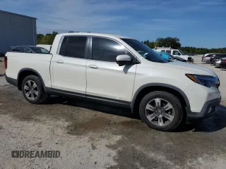 2019 Honda Ridgeline RTL-T with VIN 5FPYK2F62KB002624, listed as a Copart auction lot 50142765 with 62,947 mi miles and Salvage title. Bid and sale history available at DreamBid. Image 4.