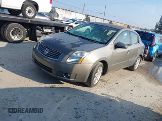 2008 Nissan Sentra S z VIN 3N1AB61E38L626610, wystawiony jako IAAI lot #42650176 z przebiegiem 184 562 mil mil oraz . Historia ofert i sprzedaży dostępna na DreamBid. Obrazek 2.