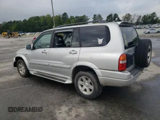 2001 Suzuki XL7 Standard z VIN JS3TX92V814116919, wystawiony jako Copart lot #72758694 z przebiegiem 185 153 mil mil oraz Szkoda całkowita • Salvage title. Historia ofert i sprzedaży dostępna na DreamBid. Obrazek 2.
