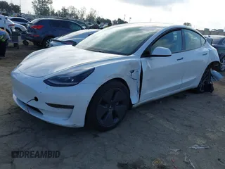 2022 Tesla Model 3 with VIN 5YJ3E1EA1NF167711, listed as a IAAI auction lot 41594266 with 50,554 mi miles and . Bid and sale history available at DreamBid. Image 20.