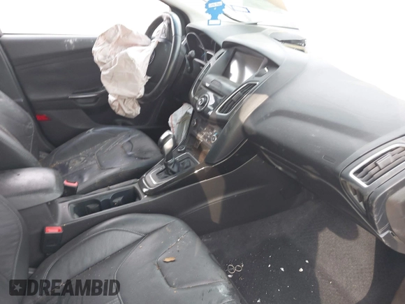 2016 Ford Focus Titanium with VIN 1FADP3J21GL404602, listed as a IAAI auction lot 42270177 with 118,369 mi miles and . Bid and sale history available at DreamBid. Image 5.