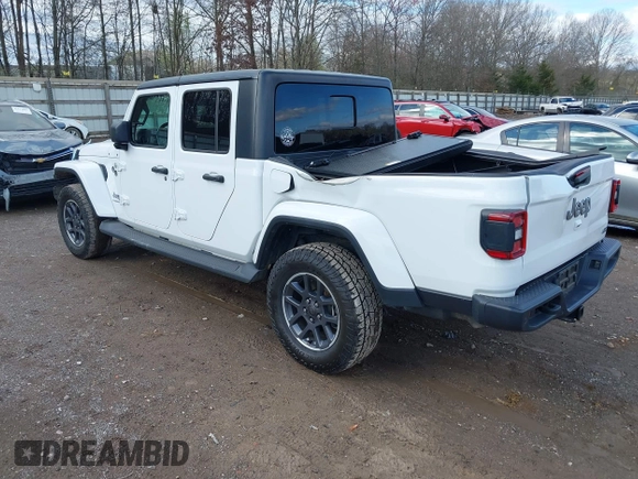 2020 Jeep Gladiator Overland with VIN 1C6HJTFG1LL107641, listed as a IAAI auction lot 41847586 with 69,664 mi miles and . Bid and sale history available at DreamBid. Image 3.