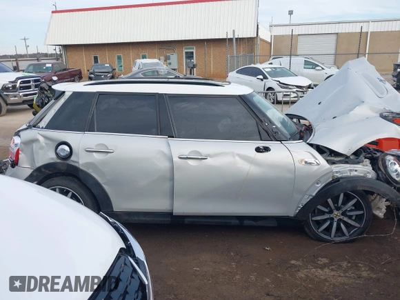 2019 MINI Hardtop 4 Door Cooper S with VIN WMWXU3C59K2H87159, listed as a IAAI auction lot 41225965 with 76,640 mi miles and . Bid and sale history available at DreamBid. Image 13.