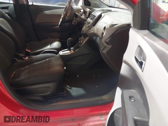 2014 Chevrolet Sonic LT with VIN 1G1JC5SH2E4214489, listed as a IAAI auction lot 41650289 with 93,388 mi miles and . Bid and sale history available at DreamBid. Image 5.