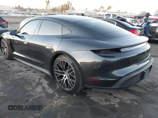 2021 Porsche Taycan with VIN WP0AA2Y15MSA18727, listed as a IAAI auction lot 41097801 with 20,933 mi miles and . Bid and sale history available at DreamBid. Image 3.