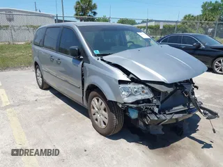 2016 Dodge Grand Caravan SE with VIN 2C4RDGBG9GR385847, listed as a IAAI auction lot 42042755 with 32,613 mi miles and . Bid and sale history available at DreamBid. Image 1.
